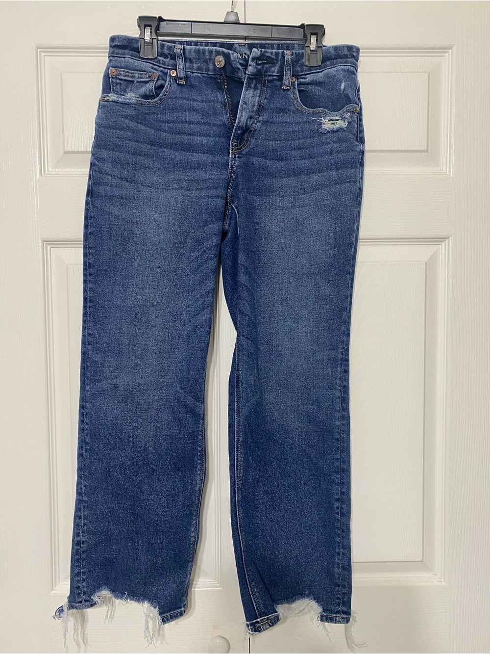American Eagle jeans with frayed raw edges hem distressed near pocket size 6